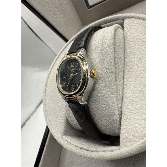 Vtg Timex Ladies Oval Watch: Black face,Black Leather Band Gold/Silver Tone Case - Picture 3 of 12